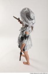 LUCI_AVIOL STANDING POSE WITH TWO GUNS